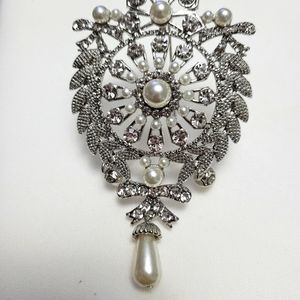 Large pearl brooch